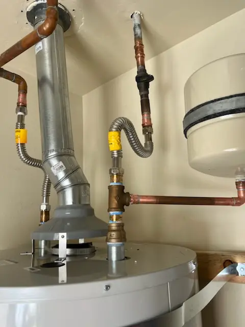 Water heater installation and plumbing repair in Macland